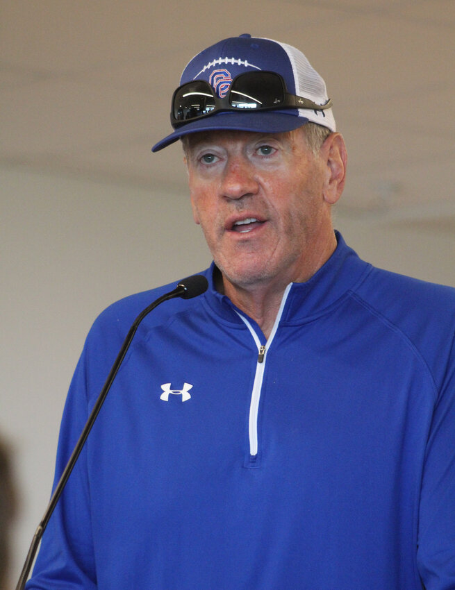 Cherry Creek football coach Dave Logan addresses the media during CHSAA Media Day at Empower Field on Aug. 14. Logan is an alumnus of CU Boulder.